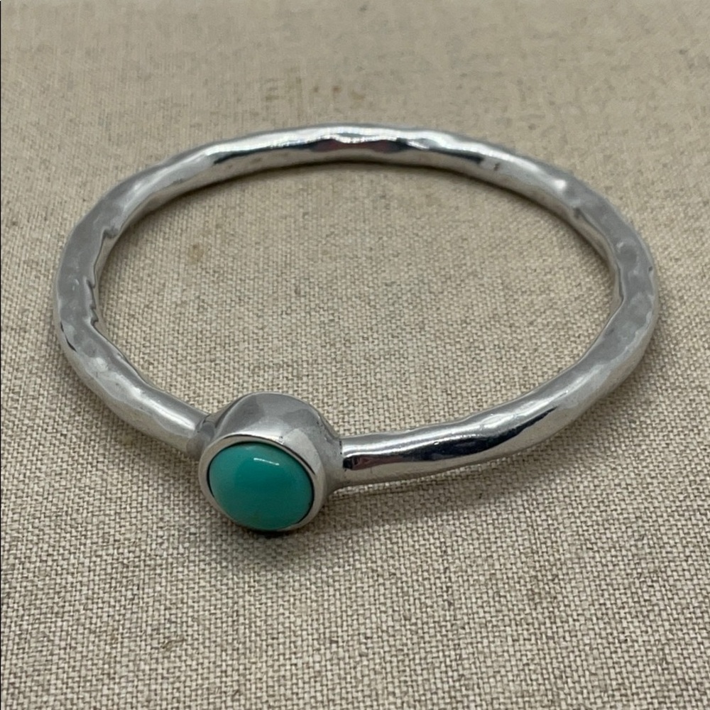 Silver Style Bangle with a Blue Stone